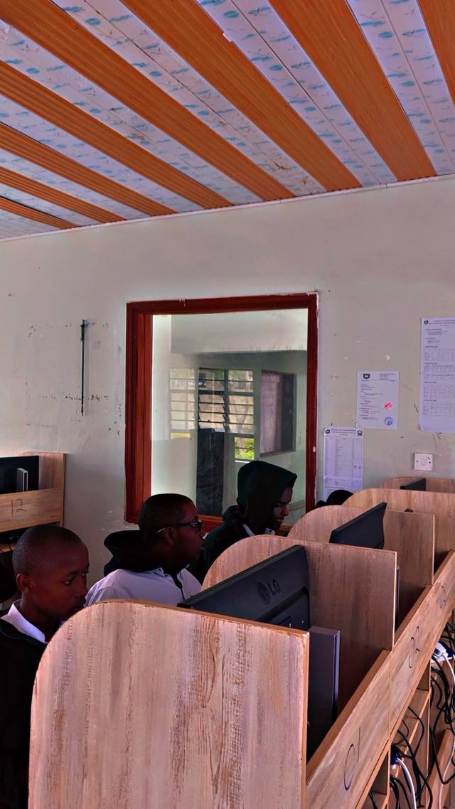 Students working at computers in the school computer lab